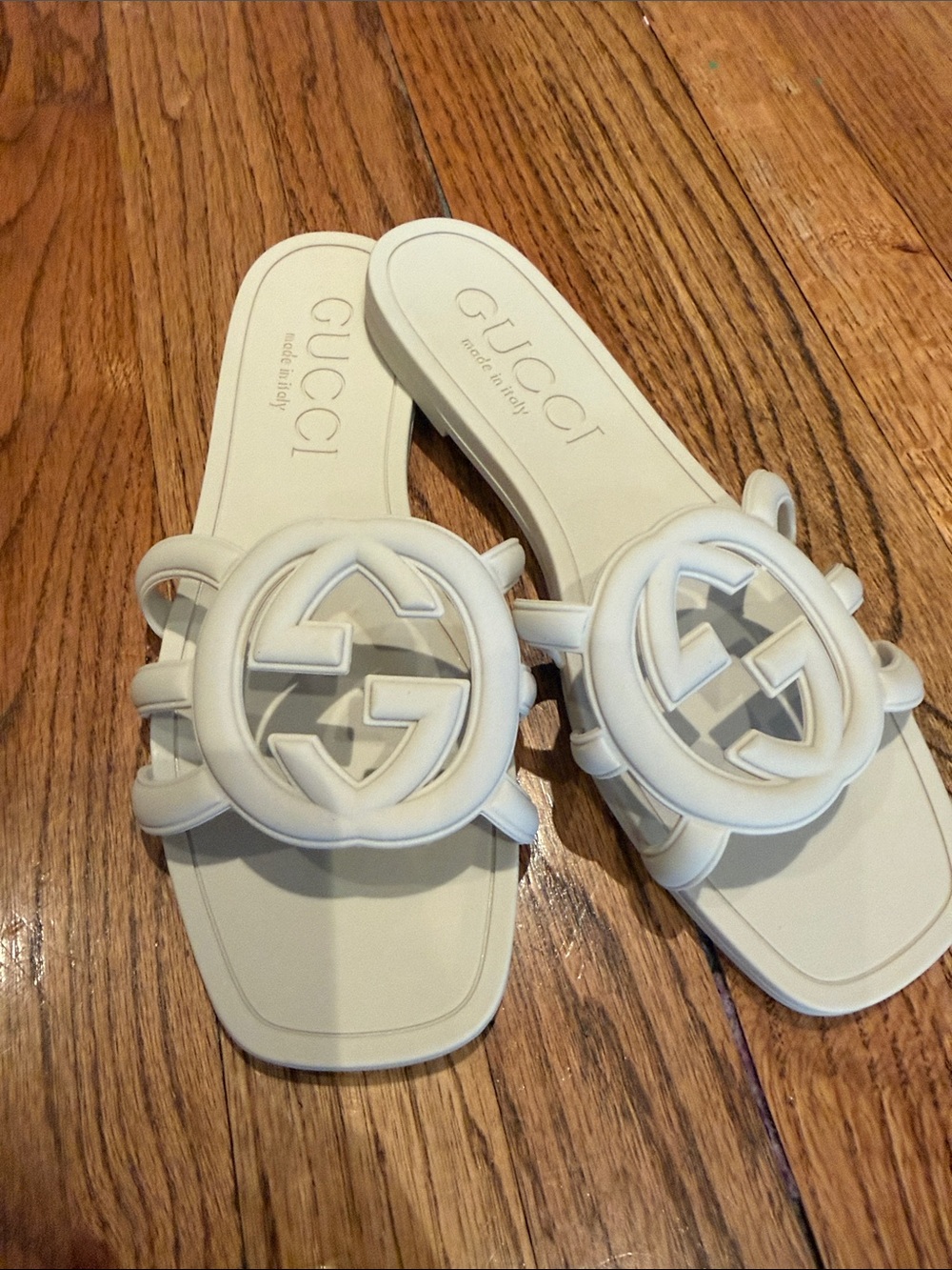 Gucci women’s off white Interlocking G Slide Sandals